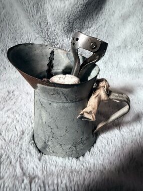 Distressed Gray Metal Pitcher Vase with Rustic Charm
